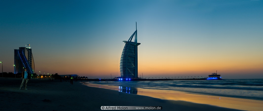 14 Burj al Arab and Jumeirah beach hotels at dusk