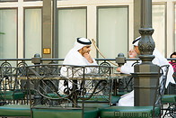 04 Dubai men talking at table