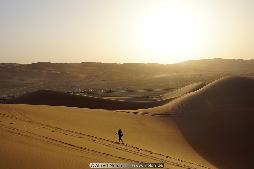07 Girl walking on sand dunes