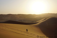 07 Girl walking on sand dunes