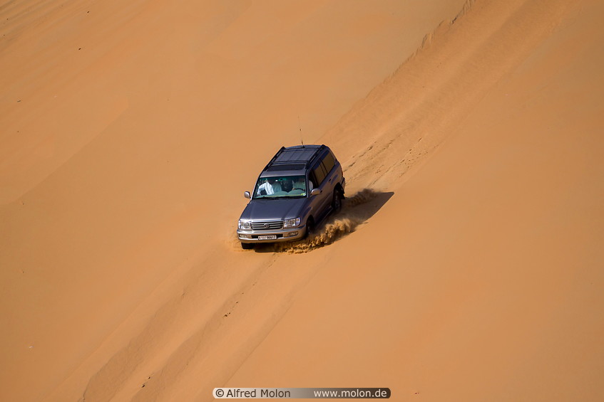 19 Off-road car on sand dune