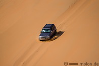 19 Off-road car on sand dune