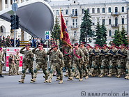 11 Soldiers marching on street