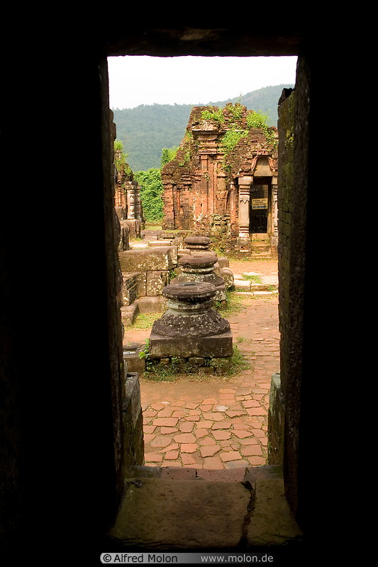16 View of ruins through gate