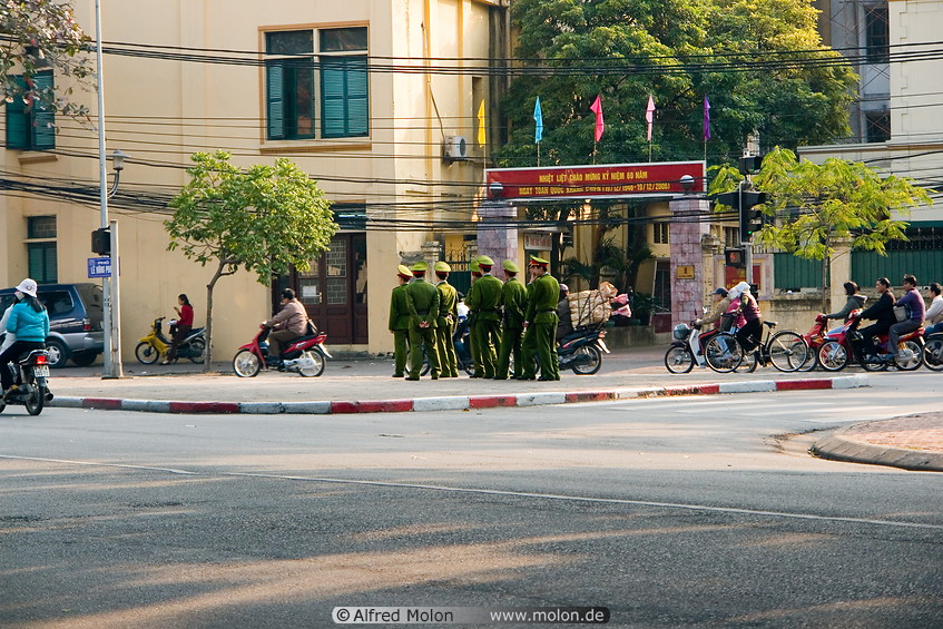 10 Vietnamese soldiers walking on the street
