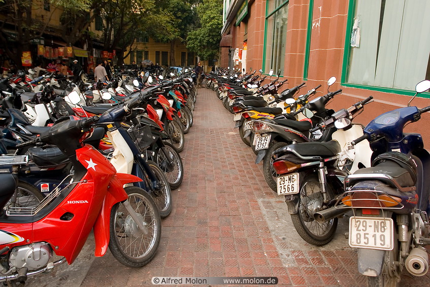 11 Motorbikes parked on pavement