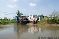 06 Huts on canal near Saigon