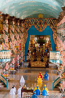 10 Frontal part of Cao Dai temple with priests and sphere