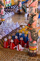 16 Cao Dai priests and ornamental columns